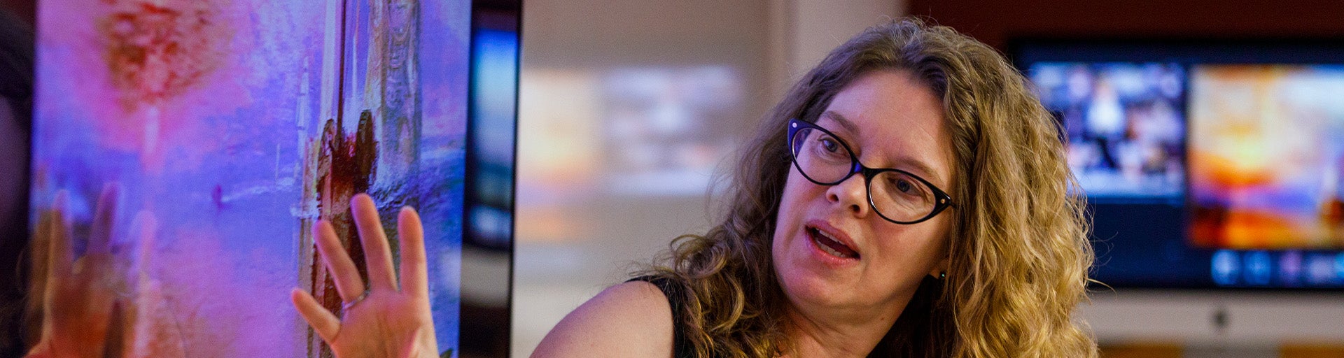 Barrett faculty Dr. Diane Gruber showing something on a screen